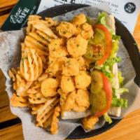 Gulf Shrimp Po'Boy · Grilled, fried or Buffalo style with lettuce, tomato & pickle