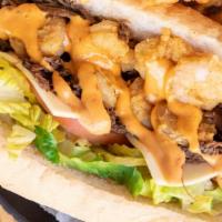 The Ernster Po'Boy · Slow-cooked roast beef, swiss cheese, and deep-fried Gulf shrimp, Ernst sauce with lettuce, ...