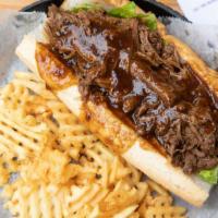 Roast Beef Po'Boy · Slow-cooked roast beef with lettuce, tomato & pickle
