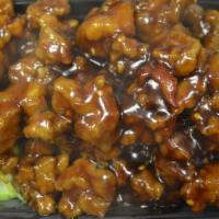 General Tso'S Chicken · Hot. Chunk of chicken breaded and deep fried in an amazing sweet spicy sauce bedded with Fre...