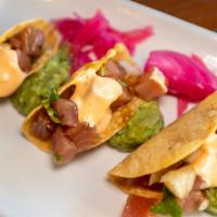 Ahi Tuna Tacos · SIGNATURE dish. ask about GLUTEN-FREE version