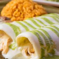 Enchilada Chicken Two · Pulled chicken enchiladas, monterey jack, with sour cream poblano sauce