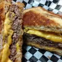 Our New Patty Melt · Half pound burger with American cheese and grilled onions on grilled rye. Talk about comfort...