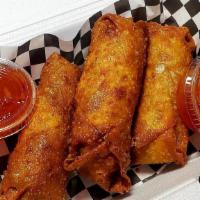 Boudin Eggrolls · Sausage made with pork, rice, vegetables and seasonings wrapped in crispy eggroll wrappers. ...