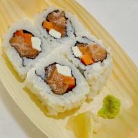 Philly Salmon Roll (4) · Fresh salmon, cream cheese, and carrot. 1/2 roll sushi

Consuming raw or undercooked meats, ...