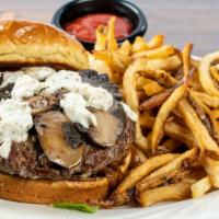 The Fancy Pants · Seasoned with white truffle oil and topped with herbed goat cheese and wild mushrooms served...