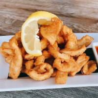 Calamari · Deep fried squid served with a sweet chili sauce.