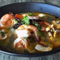 Tom Yum (Bowl) · Spicy and sour soup with mushrooms, lime juice, and lemon grass.