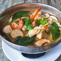 Poa Taek (Thai Seafood Hot Pot) · (Spicy) Seafood combination hot & sour soup with mushrooms, ginger, Thai herb & chili lime j...