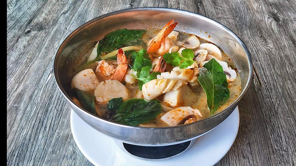 Poa Taek (Thai Seafood Hot Pot) · (Spicy) Seafood combination hot & sour soup with mushrooms, ginger, Thai herb & chili lime juice.
