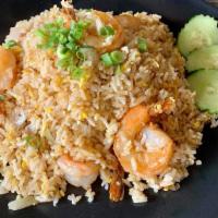Thai Fried Rice · Stir fried rice with egg, diced onions & scallions.
