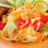 Papaya Salad · (Spicy) Tomatoes, carrots, string beans, peanuts with fish sauce and lime juice.