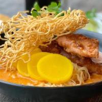 Khao Soi · (Spicy) Fried tilapia or fried chicken with egg noodles, red onions, pickled daikon top with...