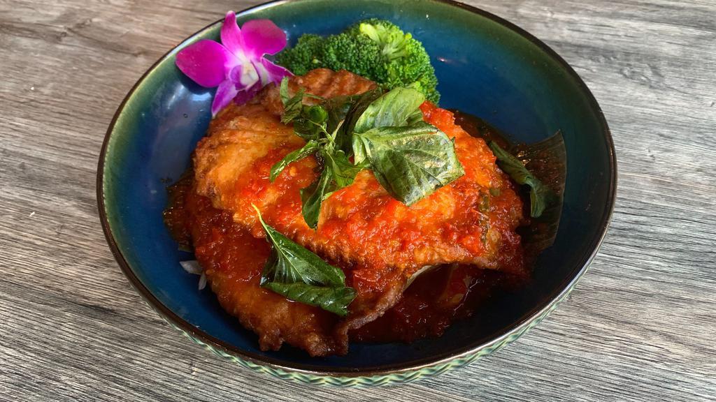 Fried Fish · (Spicy) Fried tilapia filet topped with choice of sauce – three flavors chili sauce or choo chee curry sauce.