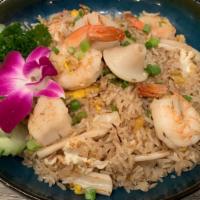 Seafood Fried Rice · Fried rice with shrimp, scallop, squid, egg, onions & scallions.
