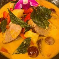 Bangkok Duck · (Spicy) Deboned lean duck breast topped with red curry and coconut milk with grapes, pineapp...
