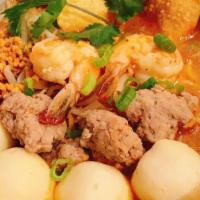 Tom Yum Noodles Soup · Rice or egg noodles spicy soup with shrimp, fish ball, ground pork, bean sprouts, ground pea...