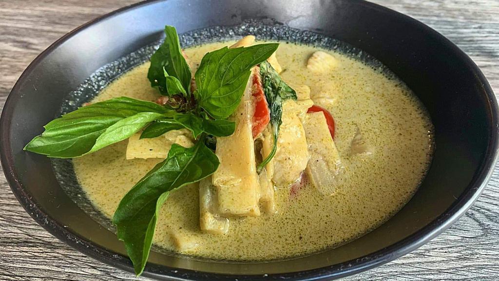 Green Curry · Bamboo shoots, red bell peppers and basil in coconut milk.