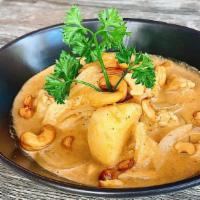 Massaman Curry · Potatoes, onions, cashew nuts in coconut milk.