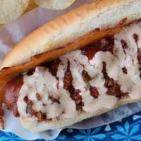 Naco Dog (1) · The dog that started the revolution! 
Grilled cheddar cheese, chili and Taco Juice. 
½ dog, ...