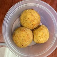 Papas Rellenas (2) · Two potato balls stuffed with seasoned ground beef. Served with KM sauce.