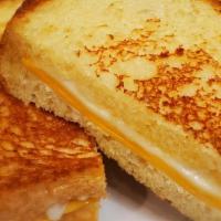 Grilled Cheese · American and White American Cheese melted perfectly on thick cut toast.
