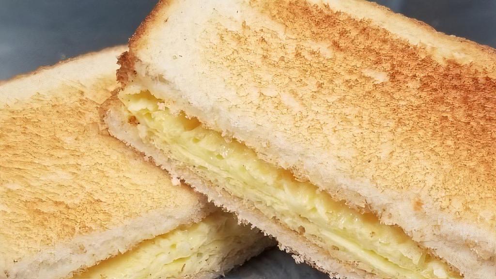 Egg Sandwich · 2 scrambled Eggs on your choice of warm toast.