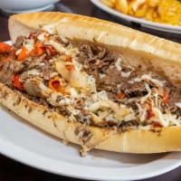Onion & Pepper Steak 1/2 Lb. Steak · 12 inch Traditional Philly.  Onions, peppers, add your cheese on a true Philidelphia hoagie.