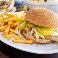 Italian Roasted Chicken Breast · Mayonnaise, pickle, lettuce, and tomato.