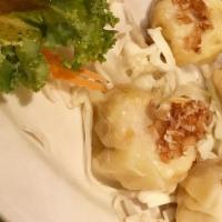 Steam Dumplings · Popular Items. Marinated chicken, shrimp steamed dumplings served with sweet soy dipping sau...