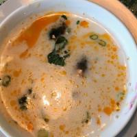 Tom Kha - Coconut Soup · Popular Items. Thai coconut soup with mushroom, cilantro and green onions with chick, pork, ...