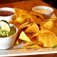 Chips & Dip · Homemade fire roasted salsa, fresh guacamole and melted queso dip, served with warm crispy t...