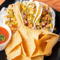 Baja Shrimp Tacos · 3 Soft Tortillas, with Shrimp, Asian Slaw, Homemade Pineapple Salsa and topped with Chipotle...