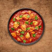 Chicken Vulcan Vindaloo · A special from the coastal state of Goa, boneless morsels of chicken, slow cooked in a hot a...