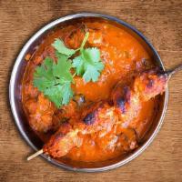 Spicy Fish Tikka Masala · Barbecue boneless fish pieces in special herbs and onion gravy.