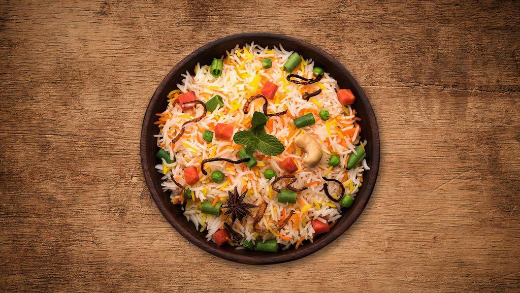 Yum Veggie Biryani · Vegetarian. Fresh vegetables cooked in our signature biryani masala gravy and long grain premium basmati rice with Indian biryani spices.