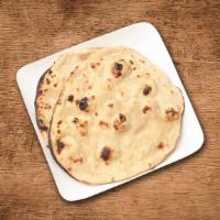 Roti · Vegetarian. House made pulled and leavened dough baked to perfection in an Indian clay oven.