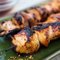 Chicken Skewers (2) · Chicken thigh skewers, marinated, flame-grilled, and seasoned.