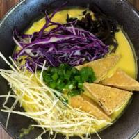 Veggie Curry · Fragrant veggie curry soup  with kale noodles topped with tofu, cabbage, bok choy, kikurage ...