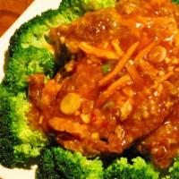 Orange Beef · Includes sauce on the side and steamed rice. mild hot and spicy.