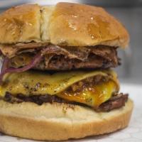 Boss Of Burgers · Two Boss patties with vegan cheese, vegan bacon, vegan chili, and grilled onions on Hawaiian...
