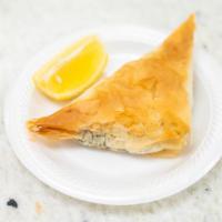Spanakopita · Spinach, onion, feta cheese, baked in philo.