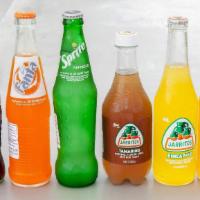 Jarritos · Fruit flavored Mexican sodas made with real cane sugar.