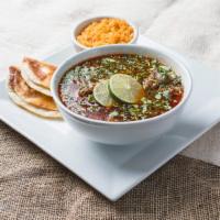 Sopa De Birria · Birria stew with onions and cilantro. Comes with small side of rice and two cheese quesadill...