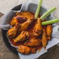 Chicken Wings · 10 piece wings with two sauce options, our own homemade buffalo sauce.