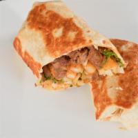 Burrito Loco · Steak, fries, cheese, guacamole, cilantro, onion, green tomatillo sauce.