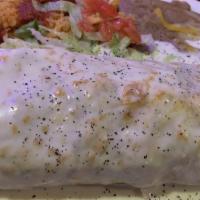 Burrito Del Mar · Big flour tortilla filled with grilled shrimp, steak, chicken, onions, bell peppers, and tom...
