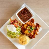 Enchiladas Mexicanas · Three corn tortillas pan-fried, filled with grilled chicken or steak. Topped with cheese dip...