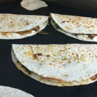 Quesadilla · Cheddar , mozzarella cheese , sweet peppers, grilled onions   (choice of meat). steak ,chori...