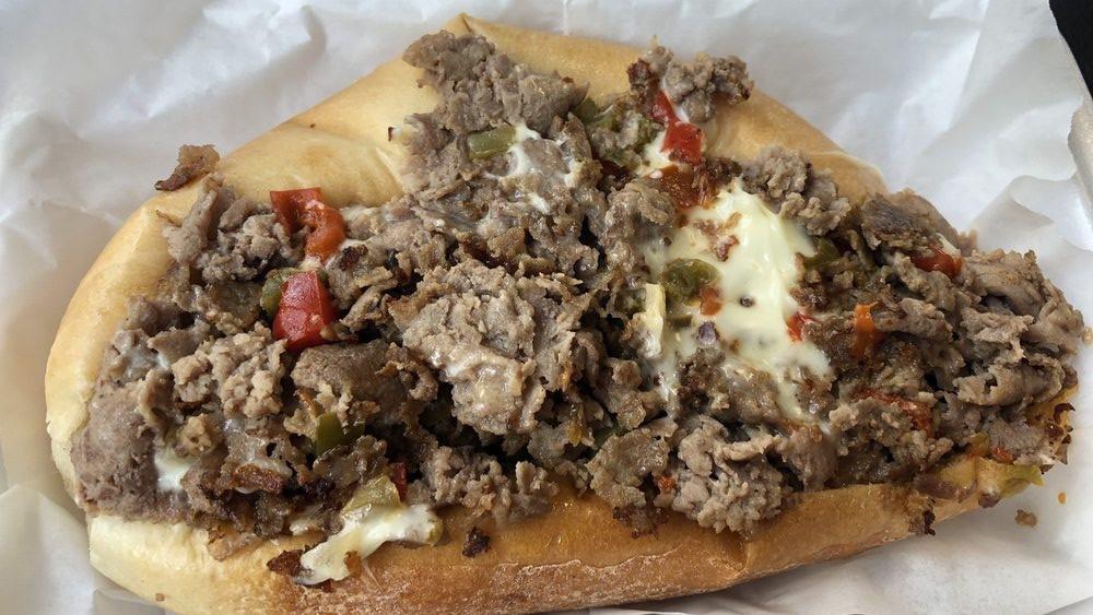 Pepper Cheesesteak Regular · Steak, white American cheese, onions, and peppers.